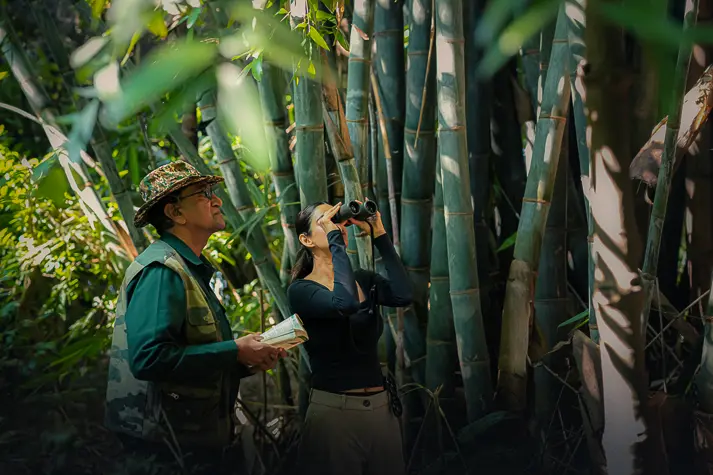 Guest in a bird watching session at Aahana with naturalist