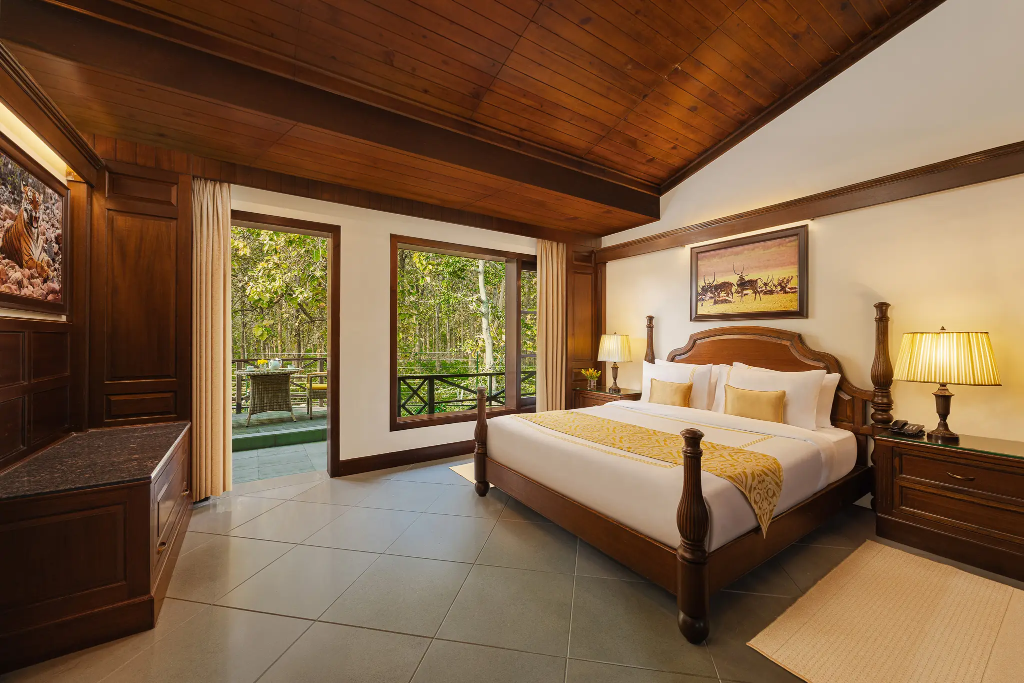 Aahana bedroom interiors with balcony overlooking the forest