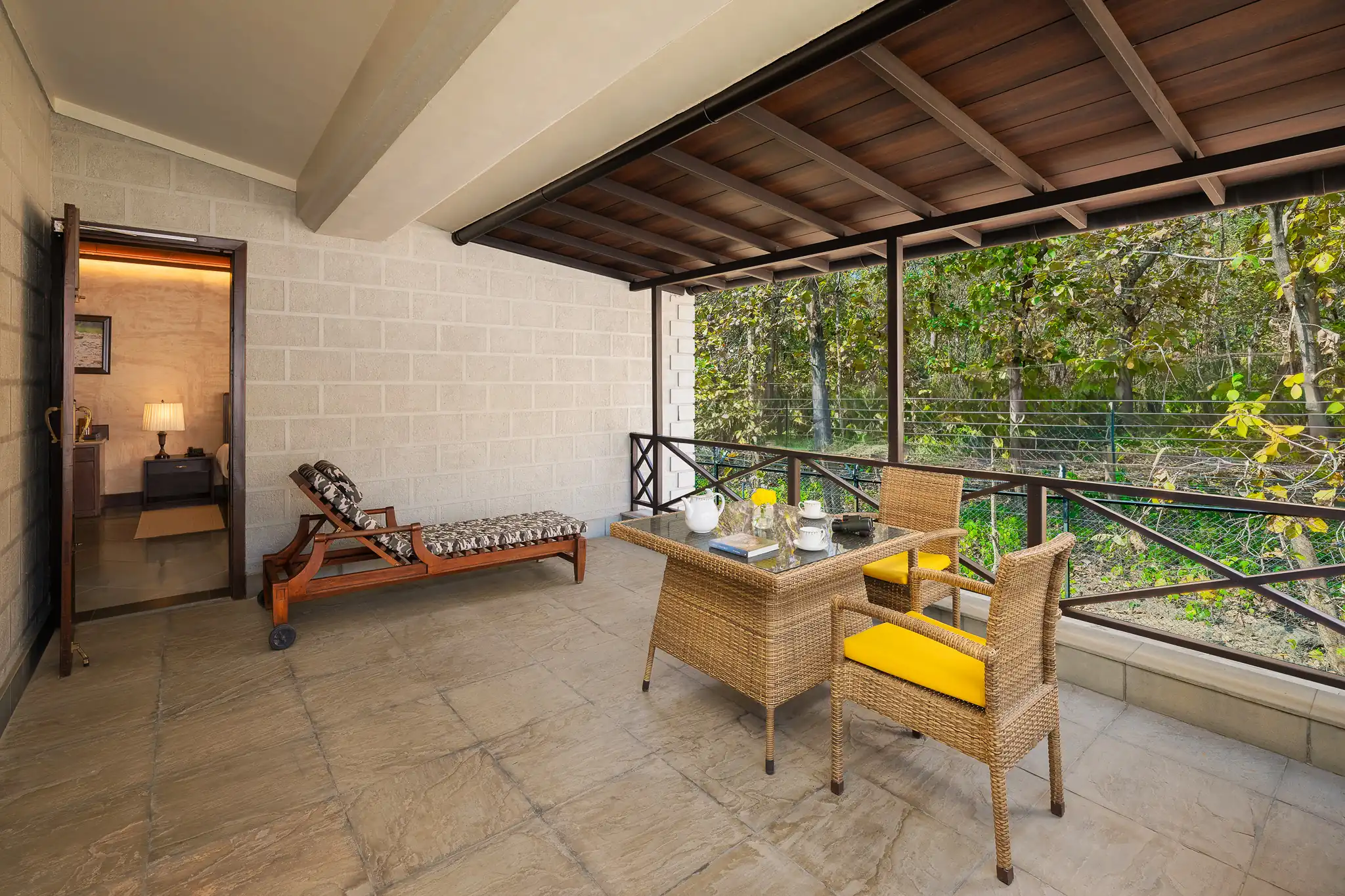 Balcony with tea and coffee overlooking the forest
