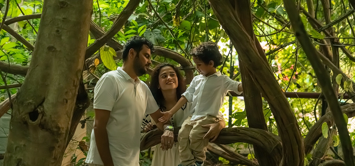 Family enjoying a nature walk at Aahana Resort.