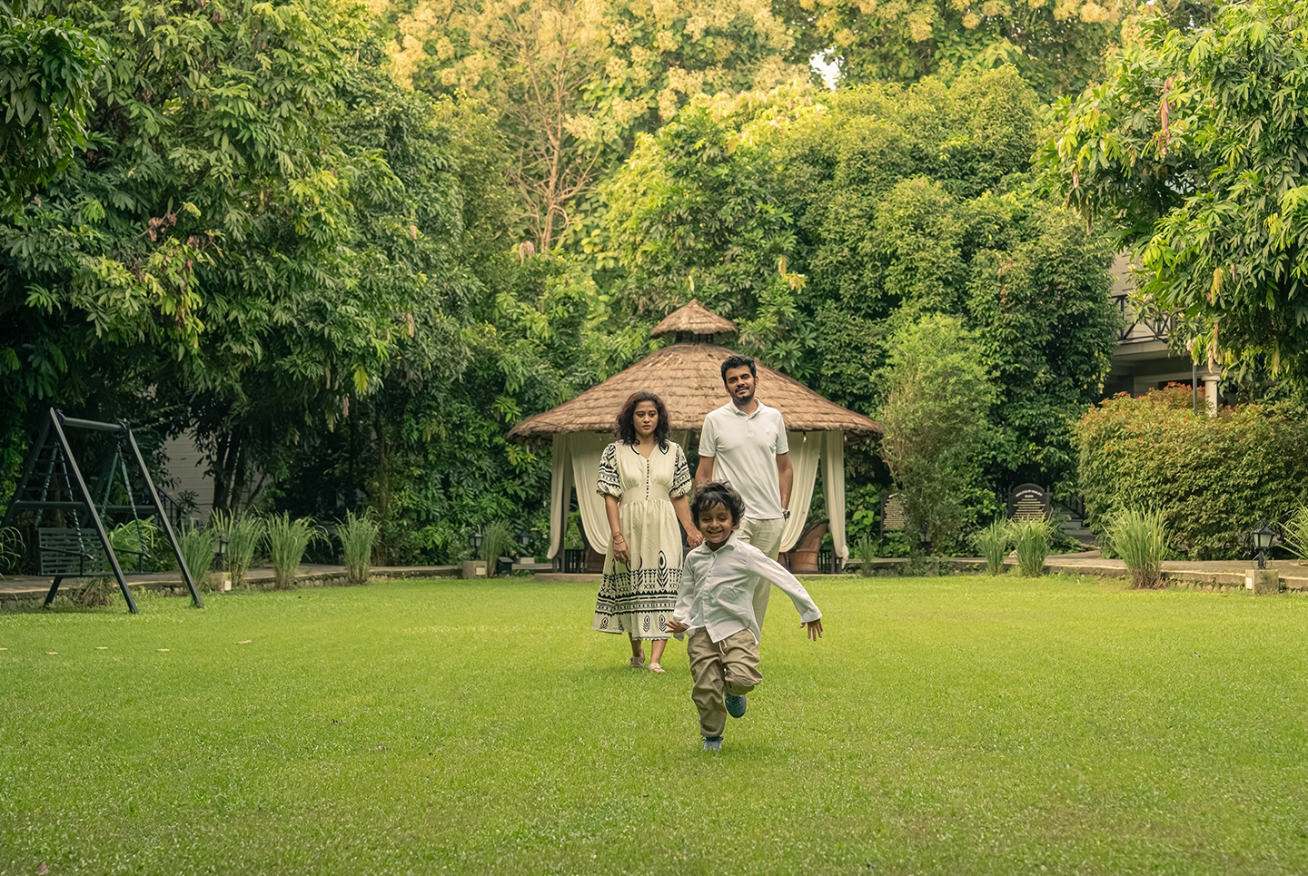 Family enjoying a nature walk at Aahana Resort.