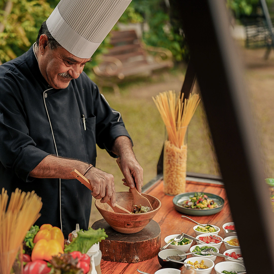 Chef at Aahana Resort preparing a dish