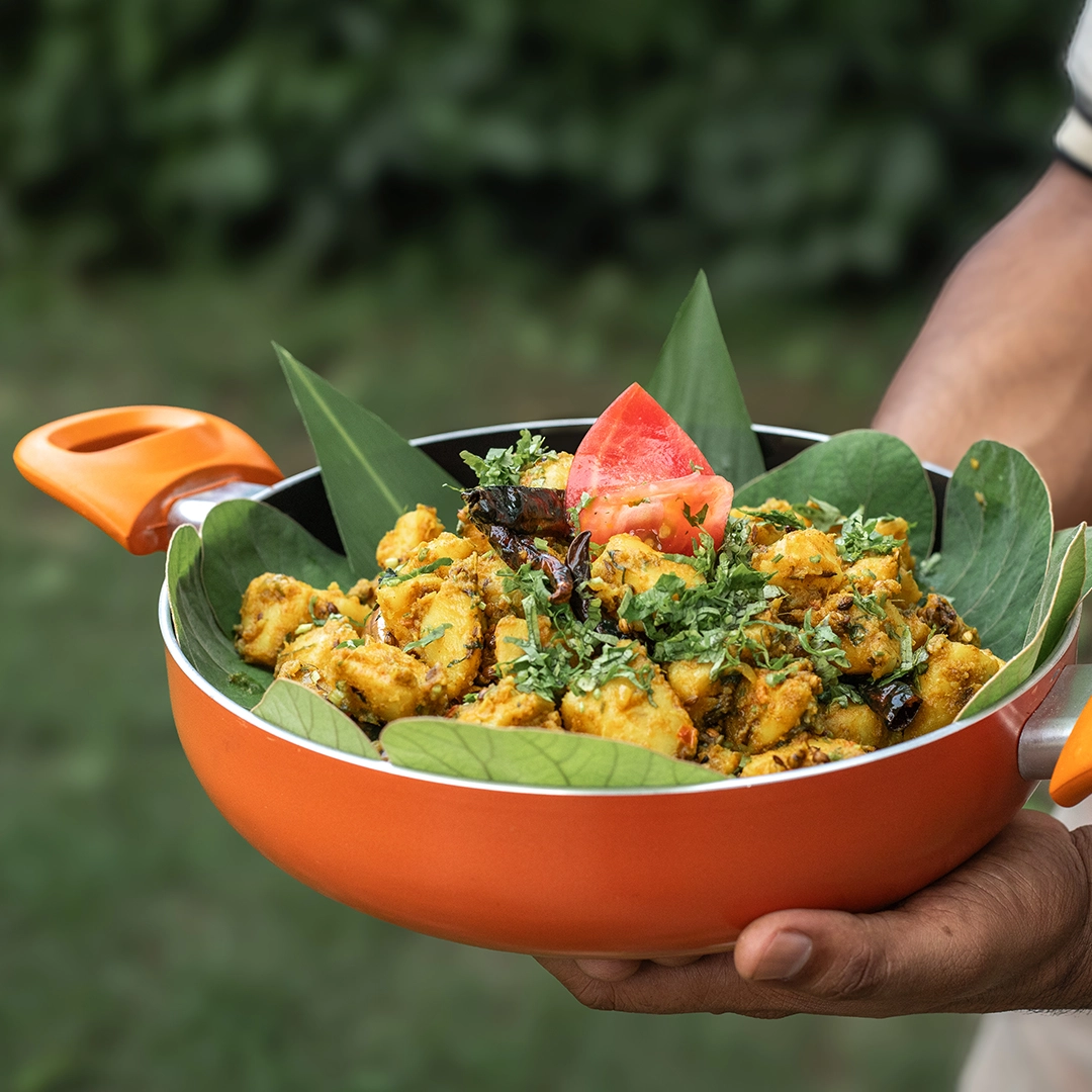 Cuisine served and presented with fresh green leaves