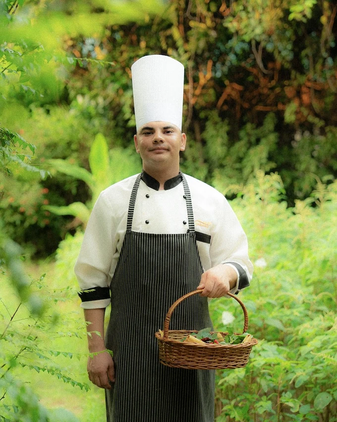 chef in organic garden at Aahana Resort
